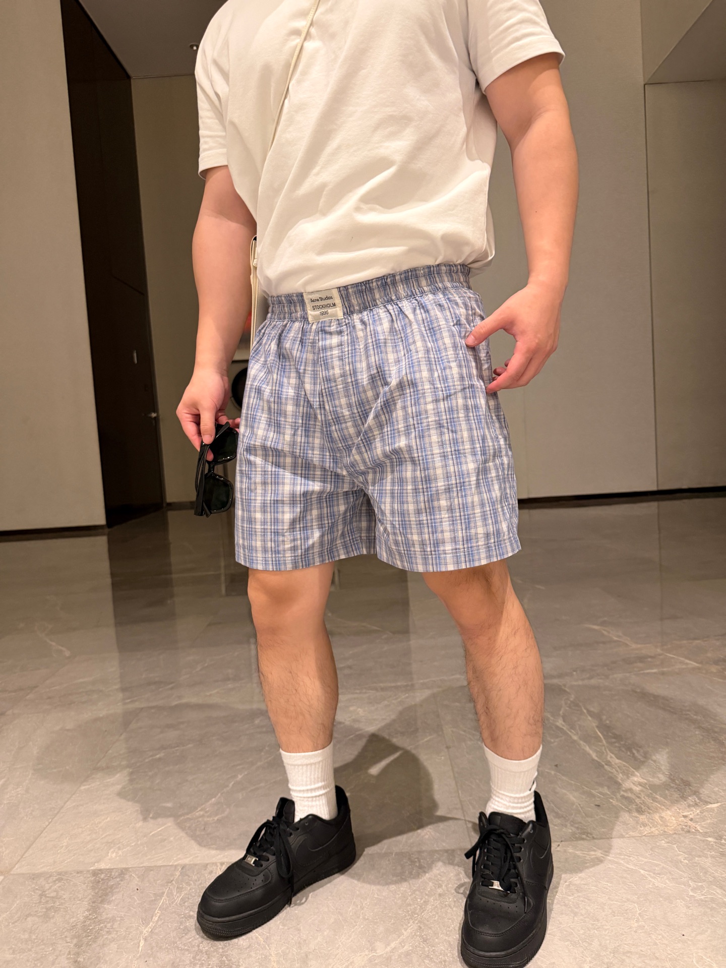 アクネ ストゥディオズのブルーのチェック柄ショートパンツ 詳細画像 1